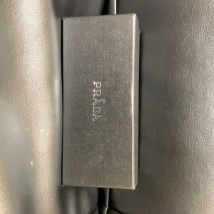 Prada Sunglasses.